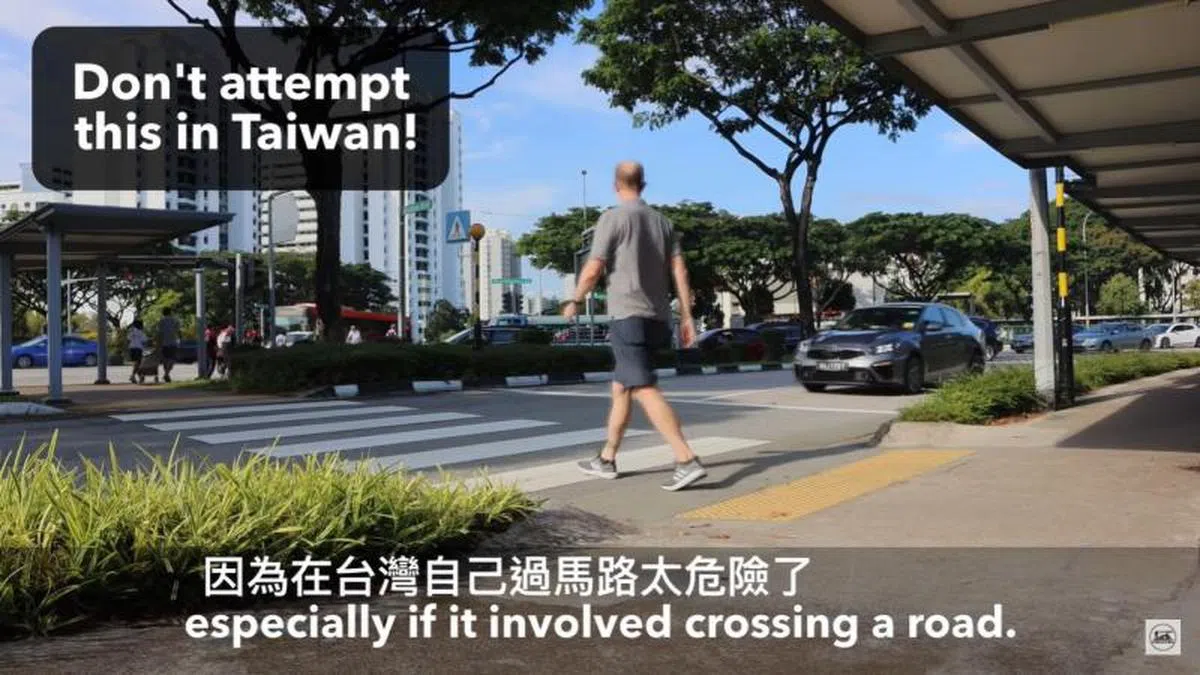  在台湾过马路必须承担的风险明显比新加坡要高。（视频截图） 