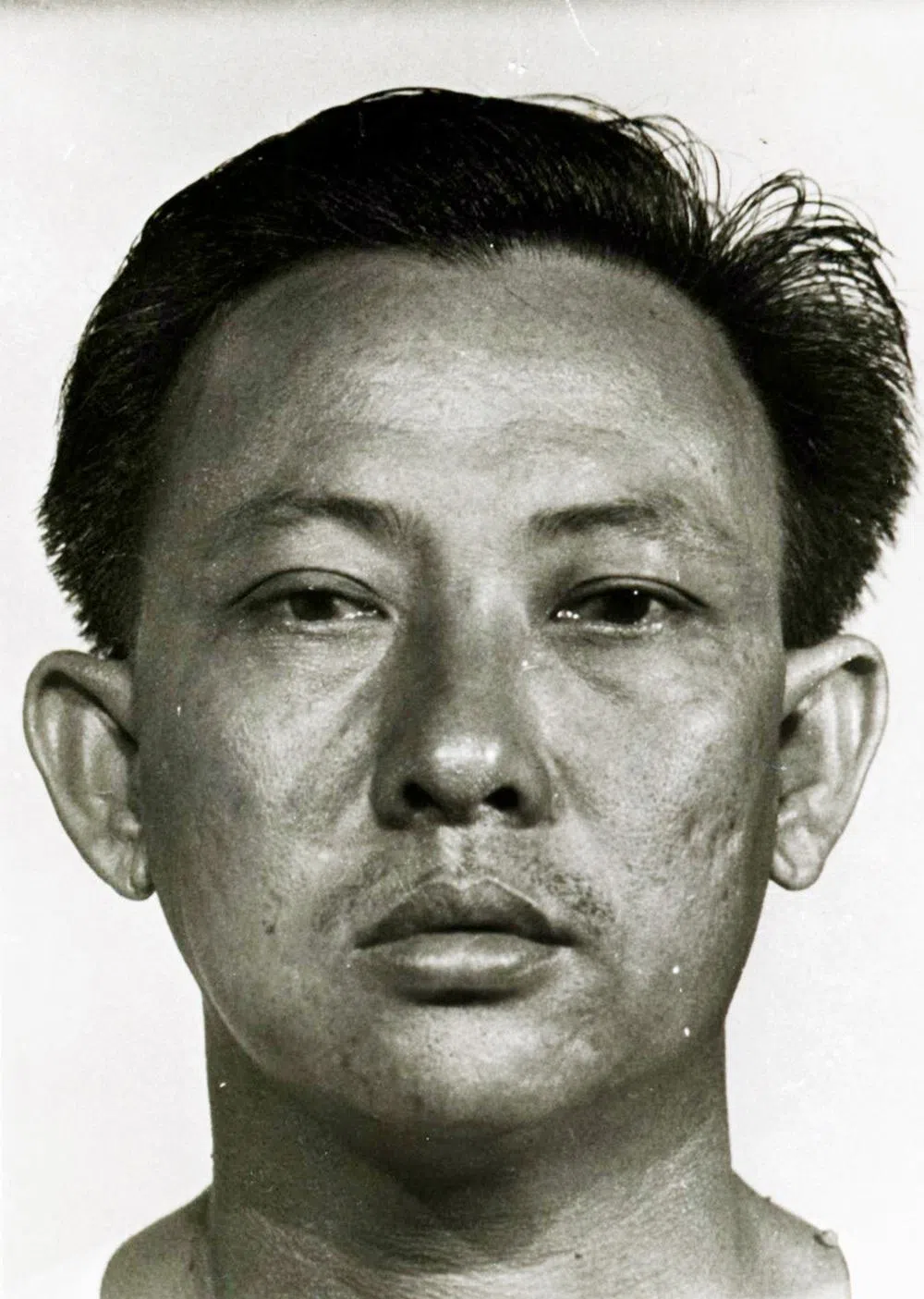 与咪咪黄育有二子的冼松锦。