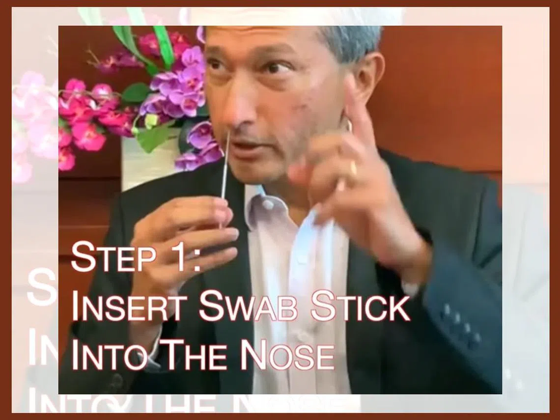 新加坡外交部长亲自示范讲解快速抗原检测（Antigen Rapid Tests，简称ART）。（维文面簿视频截图）