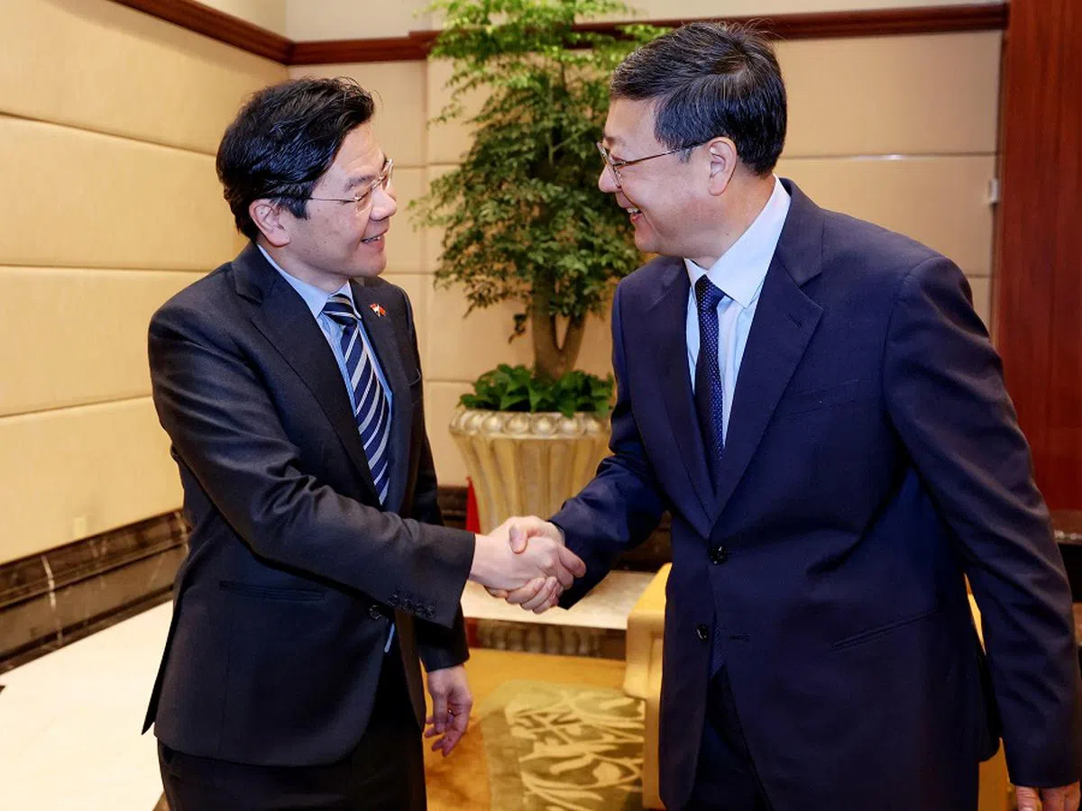 黄循财与上海市委书记陈吉宁是第一次见面。（通讯及新闻部提供）