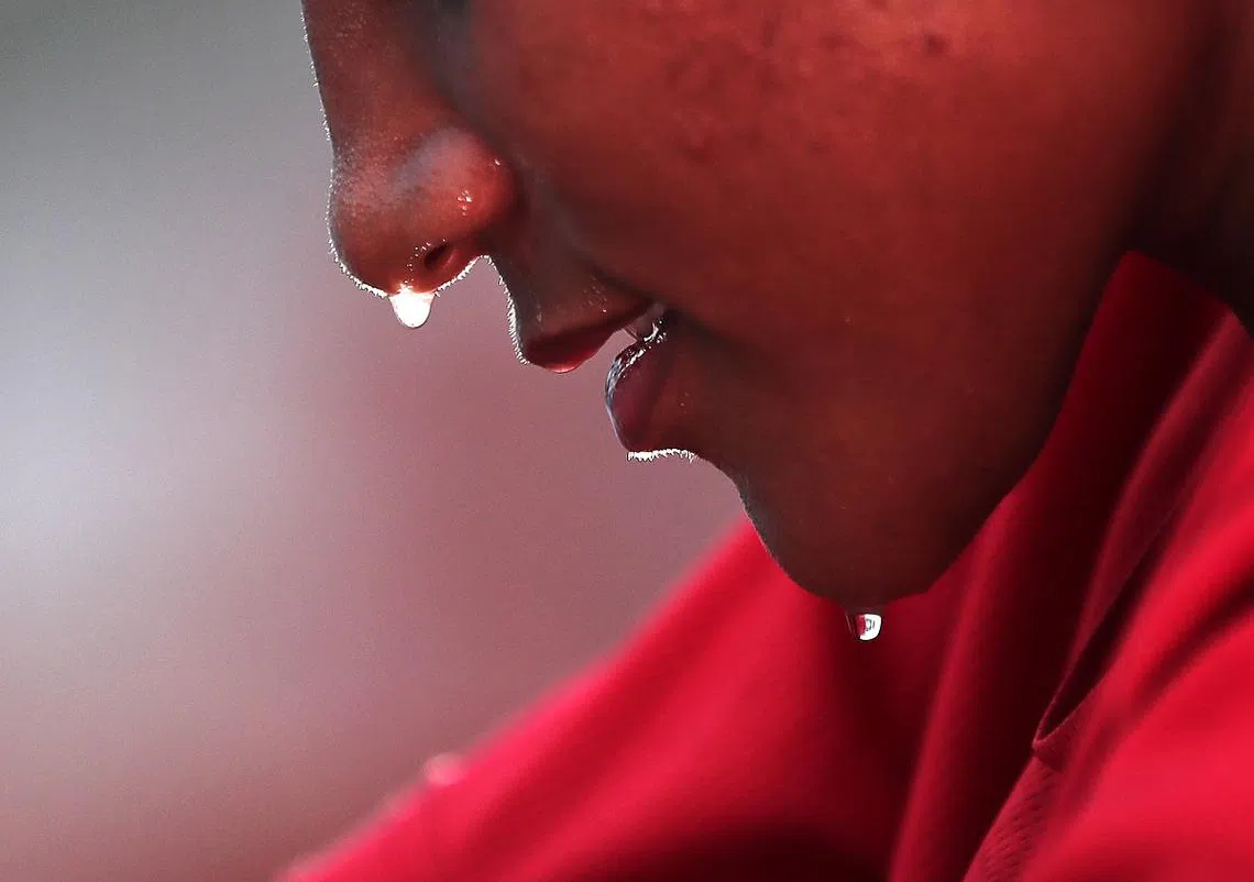 每个人的出汗量有所不同。（海峡时报）