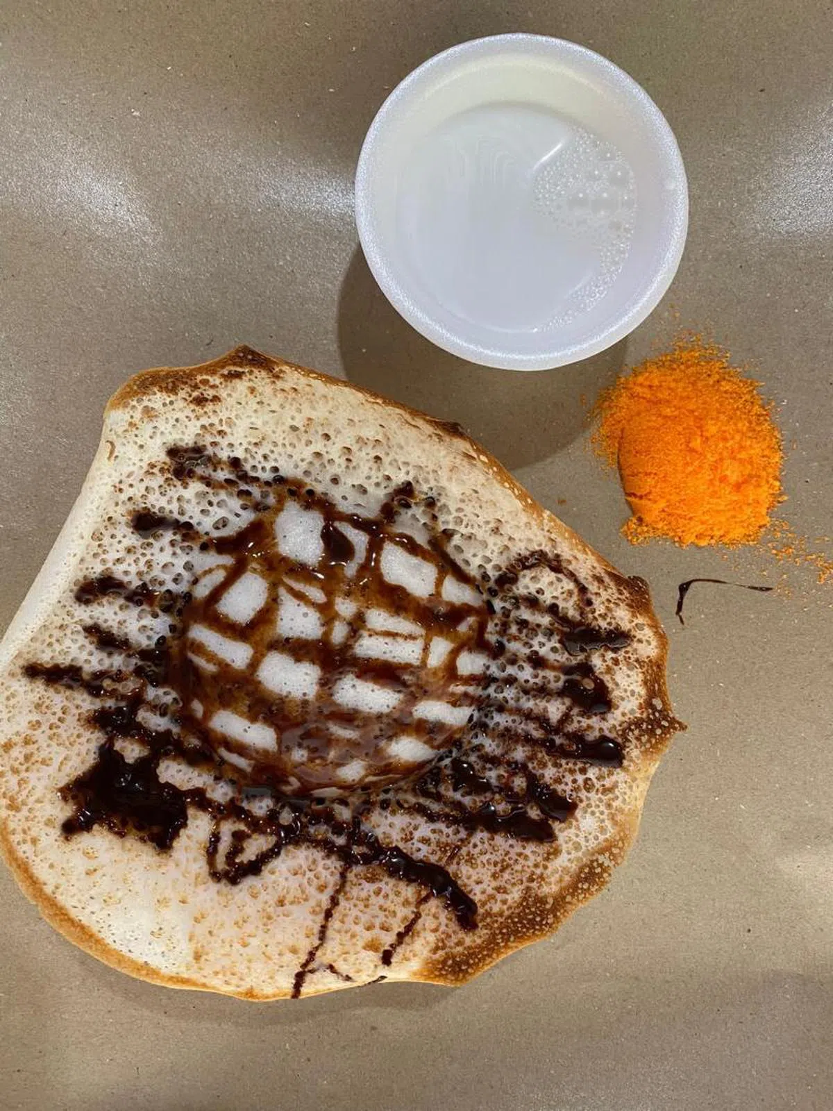 类似薄煎饼的Appam。（叶孝忠摄）