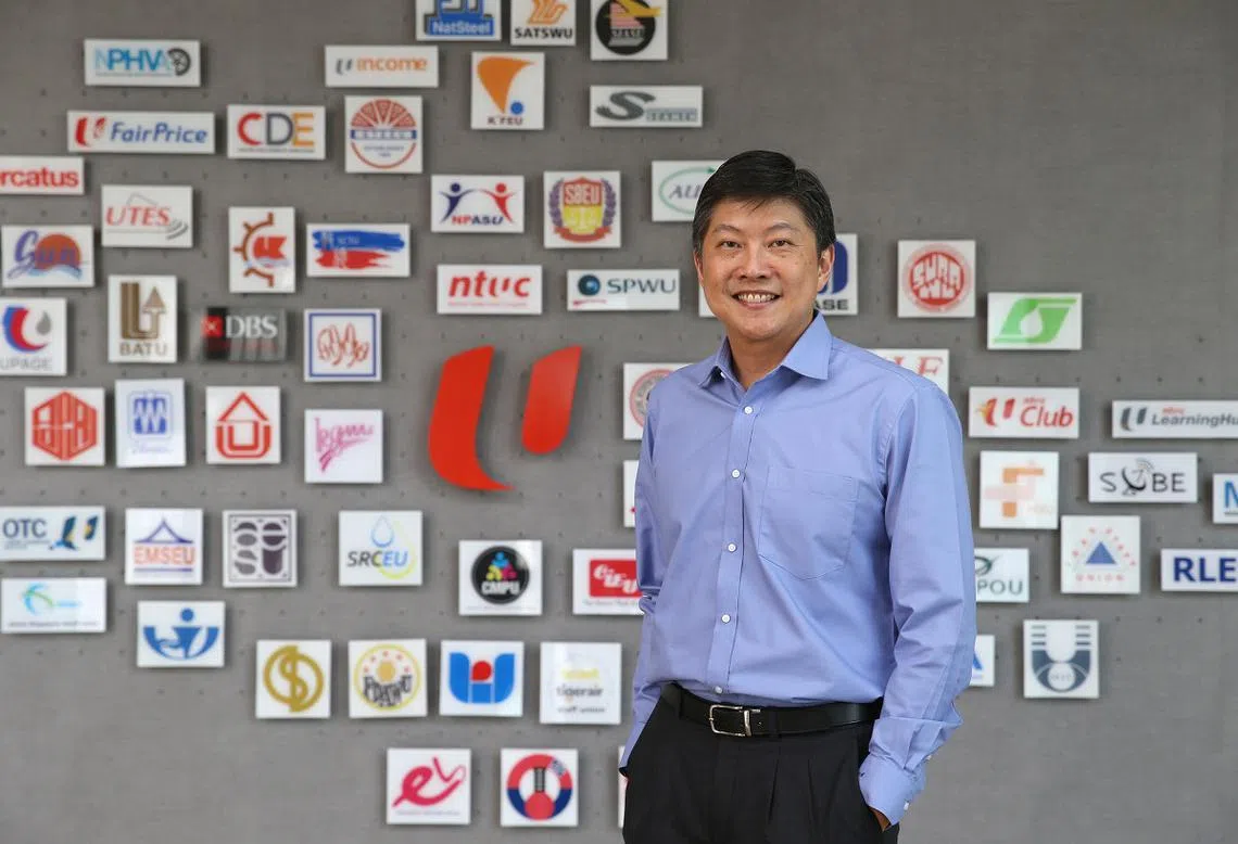 总理公署部长兼全国职工总会秘书长黄志明。（海峡时报）