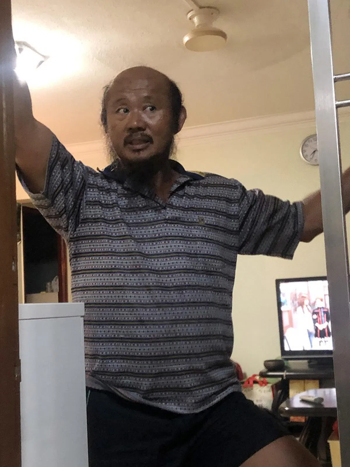  57岁的罗厘司机张胜仲（渔场老板，外号“阿仲”）。（联合早报） 