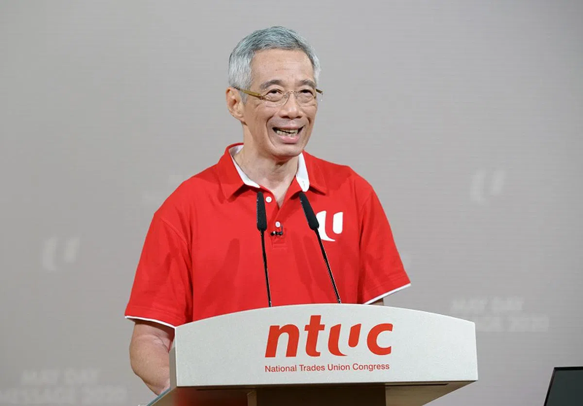  总理：我相信，我们一定能担起这个重任，共同克服这次的危机。（新闻及通讯部提供） 