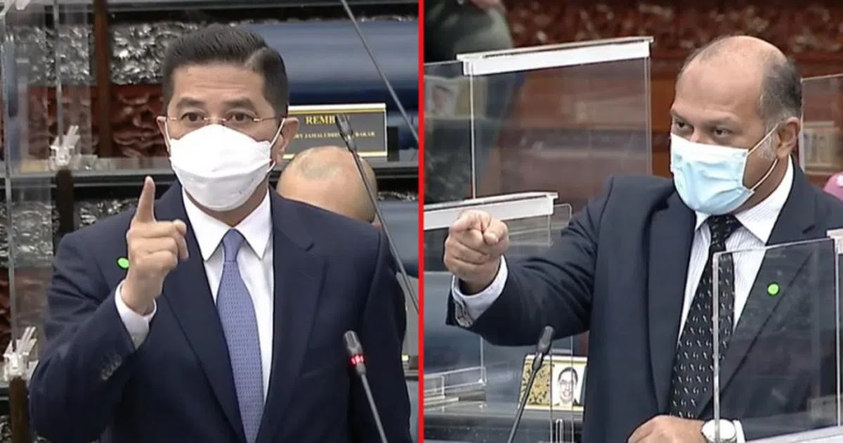 民行党蒲种区国会议员哥宾星（右）在国会上直接向阿兹敏（左）发出挑战。（东方网）