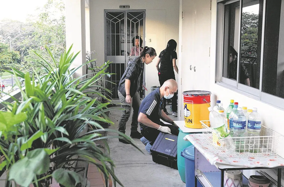  余玉莲被虐致死的兀兰9道第878座组屋三楼单位。（联合晚报） 