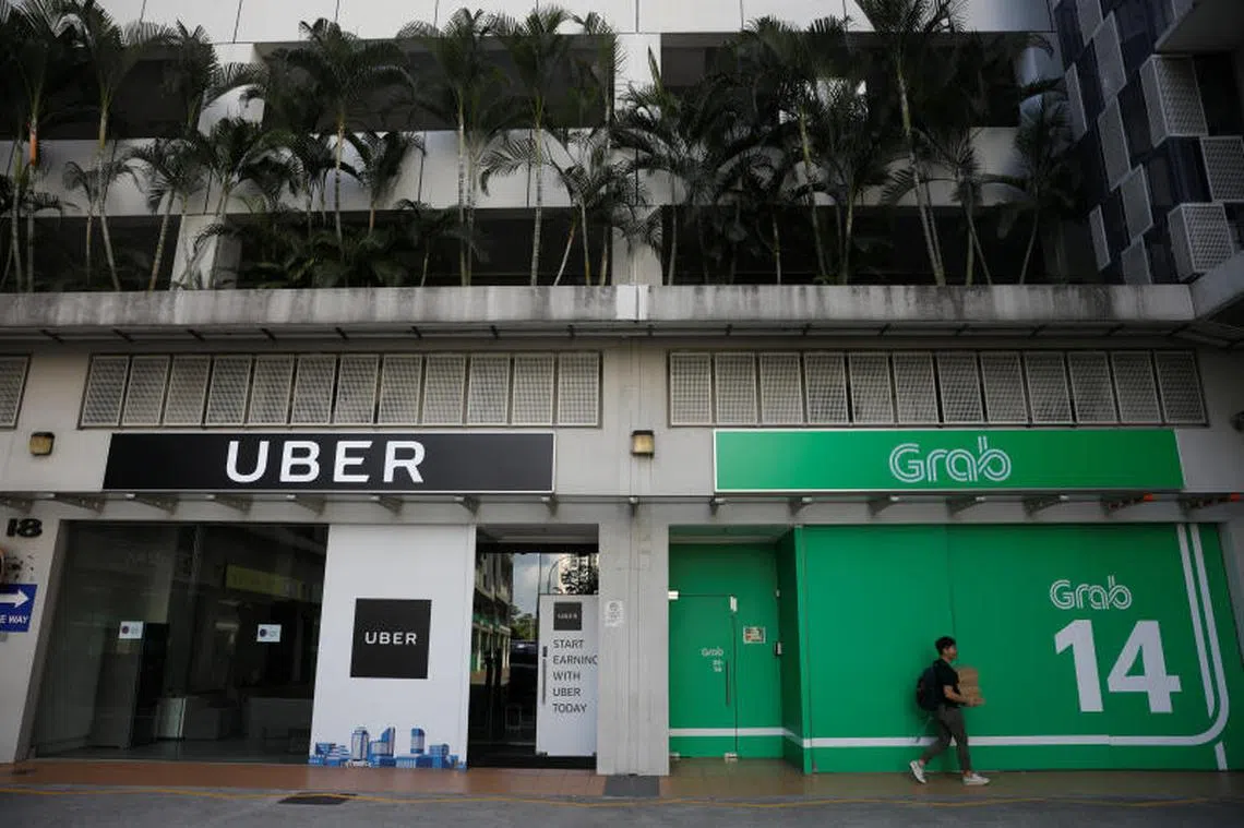 Uber与Grab在新加坡办公室。（路透社） 