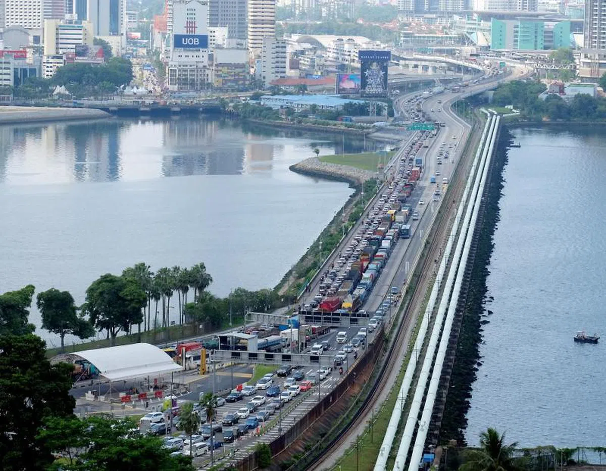 随着新马陆路通道开放，过去的塞车“盛景”恐将重现。（海峡时报）
