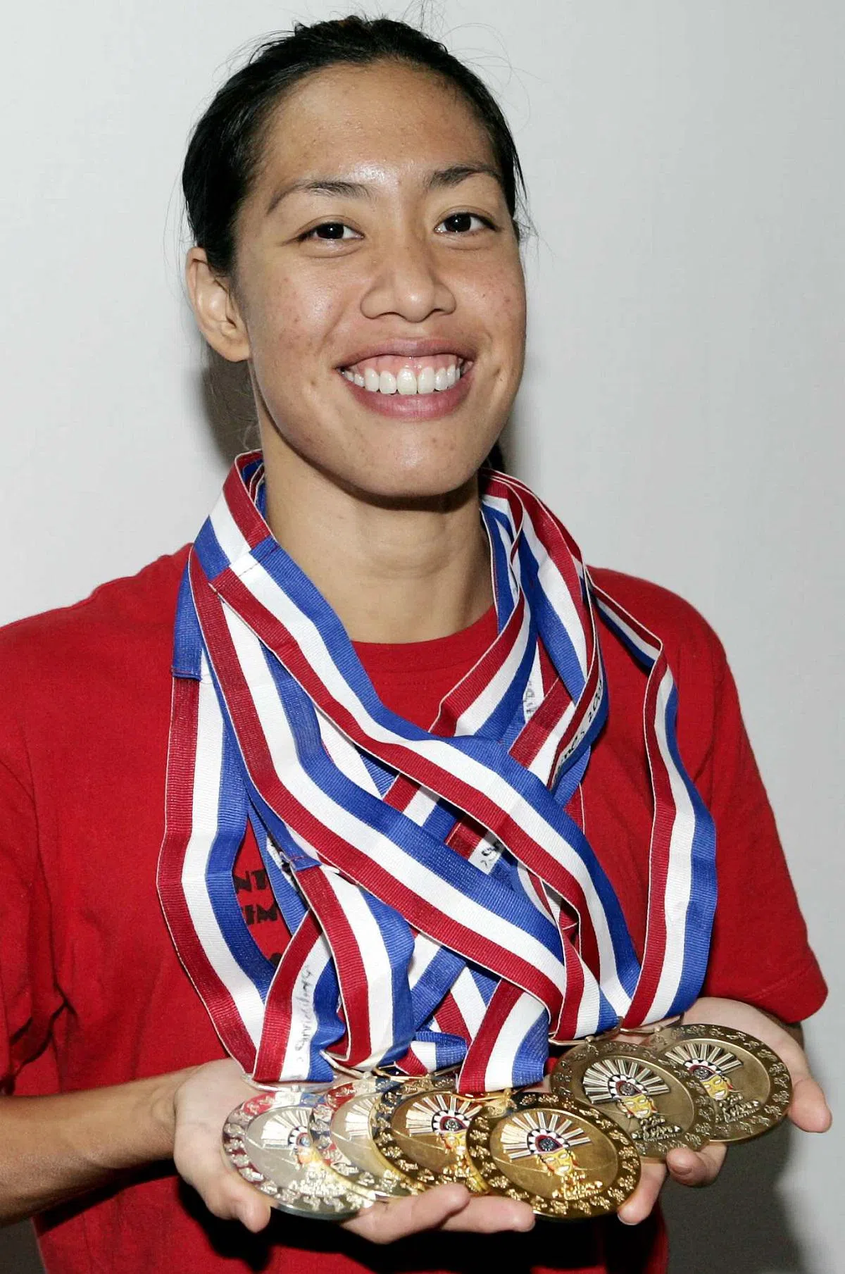 杨玮玲在第23届东运会夺得6金2银，以40面总金牌成为东运会史上夺得最多金牌的新加坡女选手。（海峡时报）
