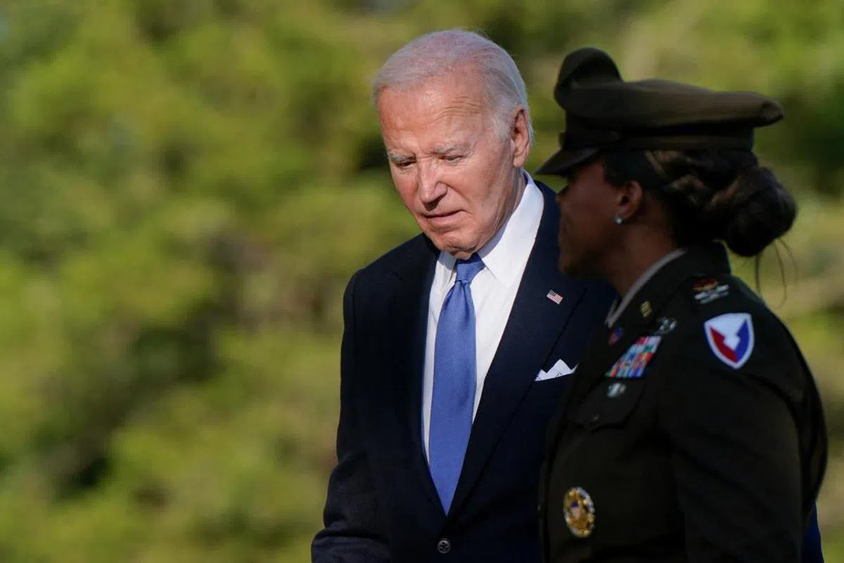 拜登坚持不退选。（路透社）