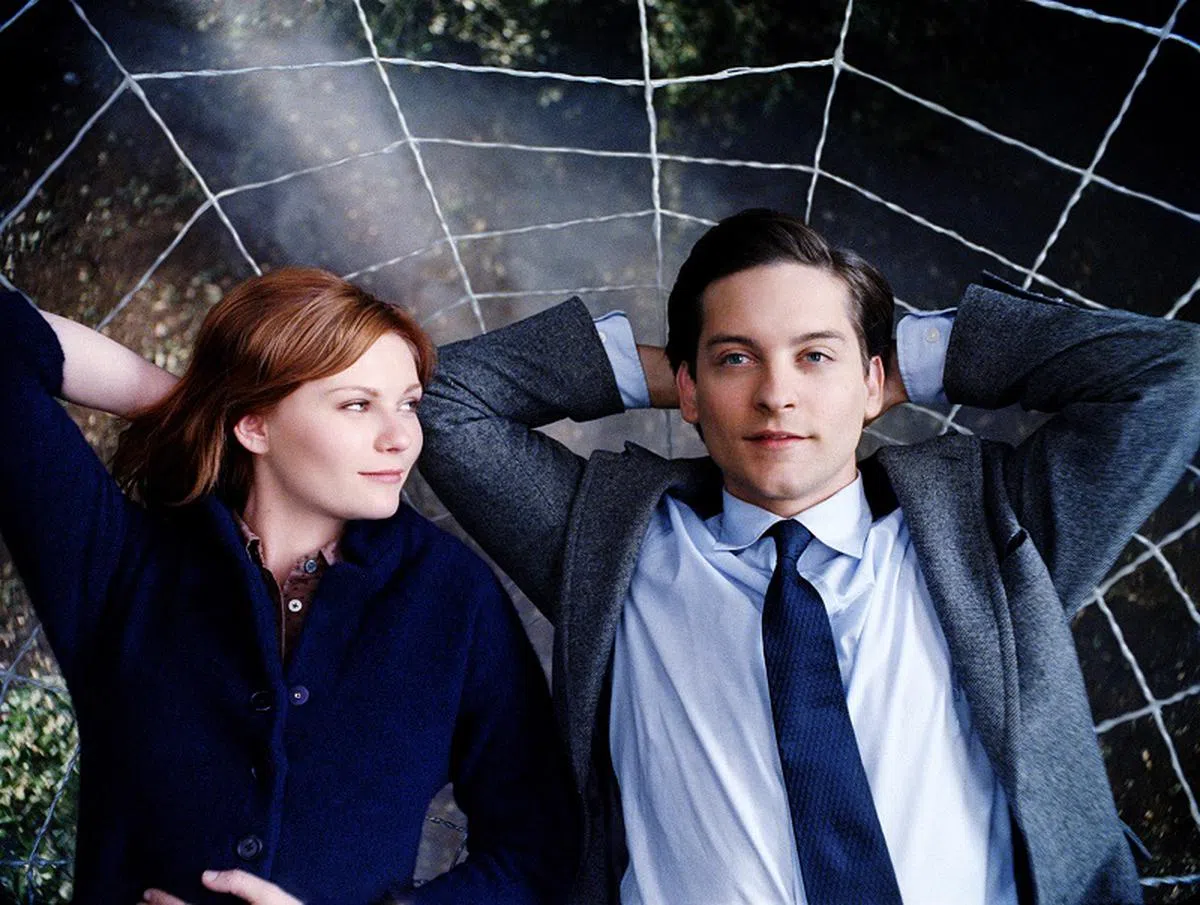  第一代蜘蛛侠电影的男女主角：Tobey Maguire（右）和Kirsten Dunst。（COLUMBIA PICTURES） 
