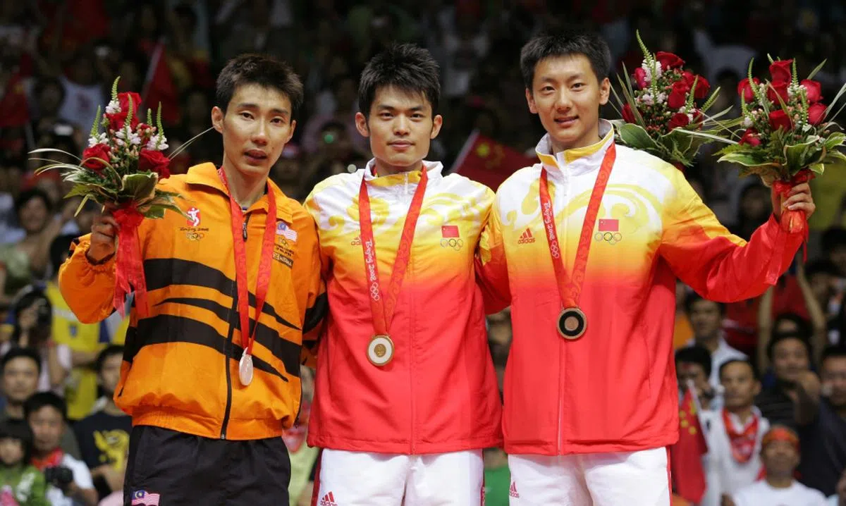  左起：2008年北京奥运会上，林丹获金牌，李宗伟获银牌，陈金获铜牌。（世界羽联） 
