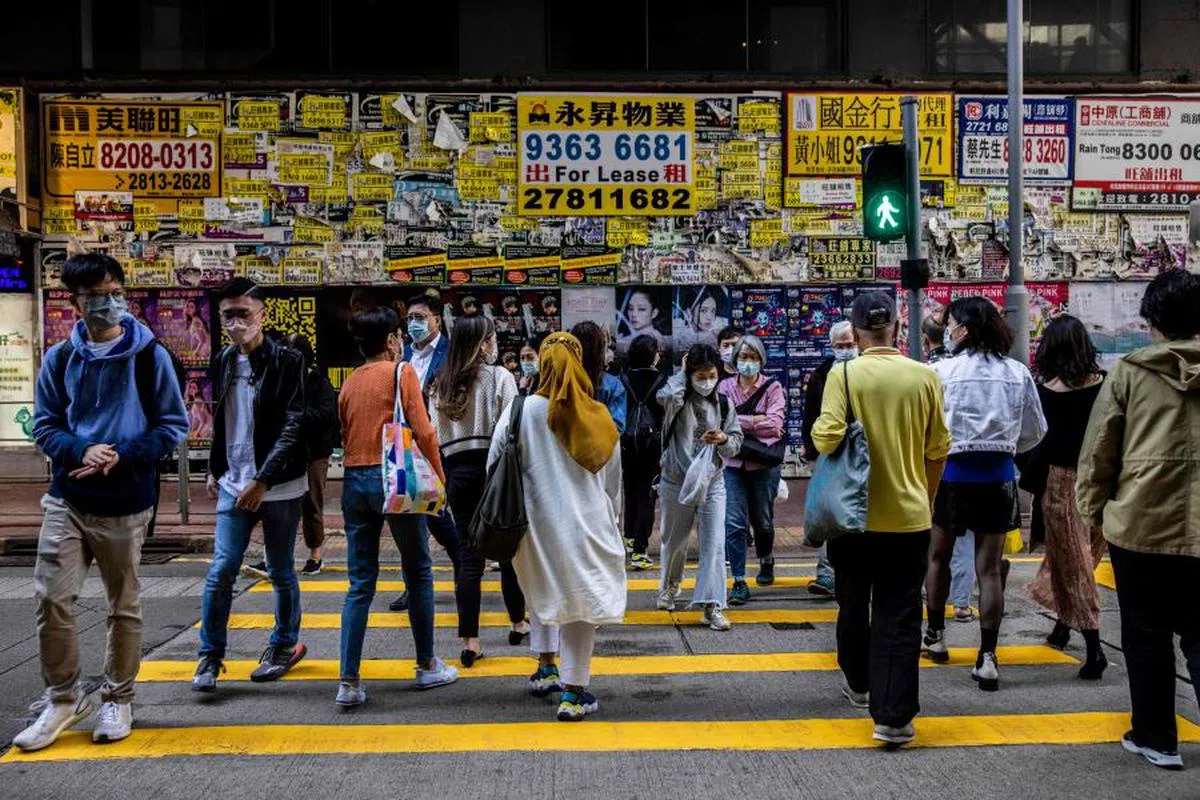香港经济近年来深受政治动荡及疫情等因素冲击。（法新社）