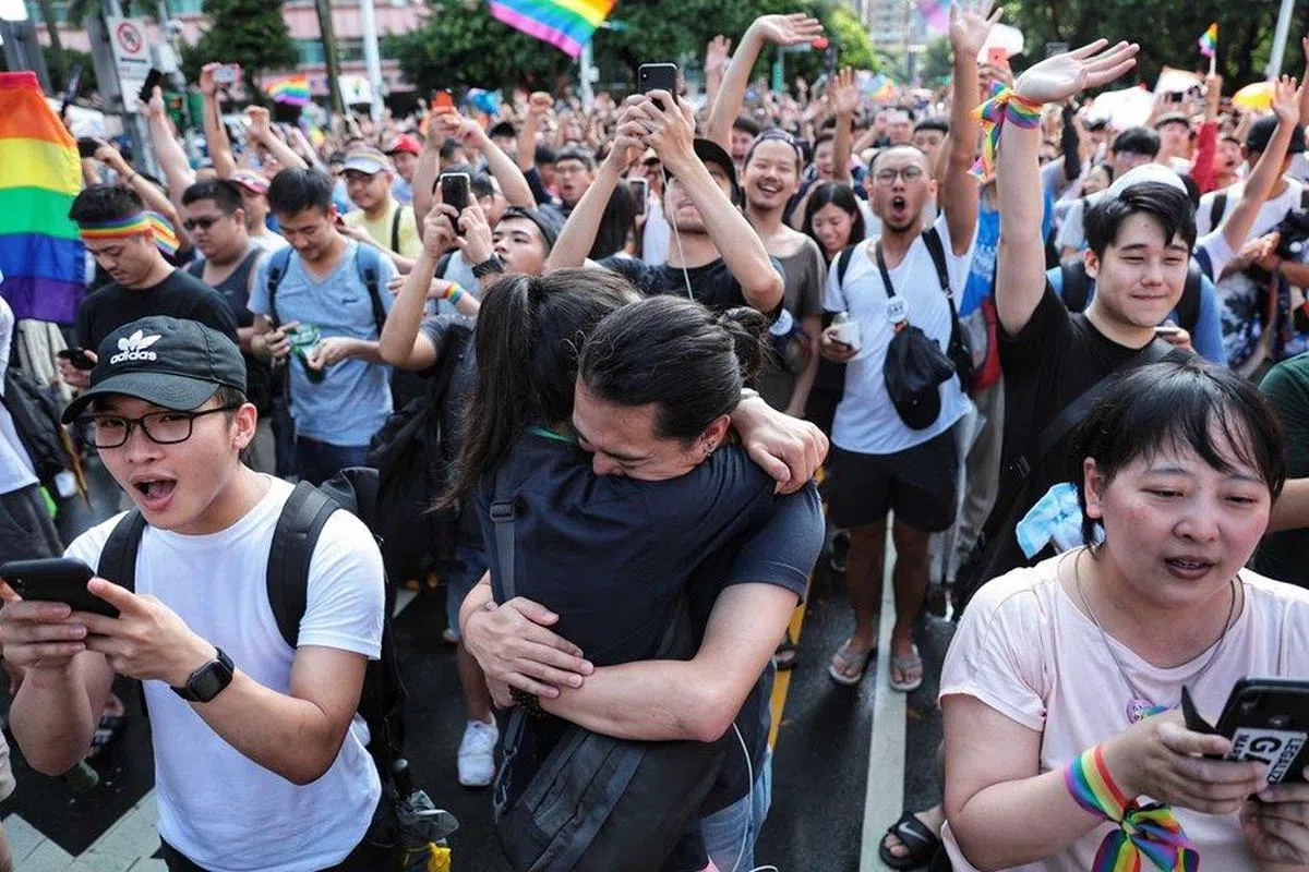  台湾立法院今年通过同性婚姻专法。（报导者） 