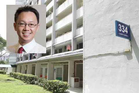 陈有明（小图）昨晚在金文泰2道第334座组屋楼下接见选民时，在会议室内遭男居民挥拳袭击。（联合晚报）