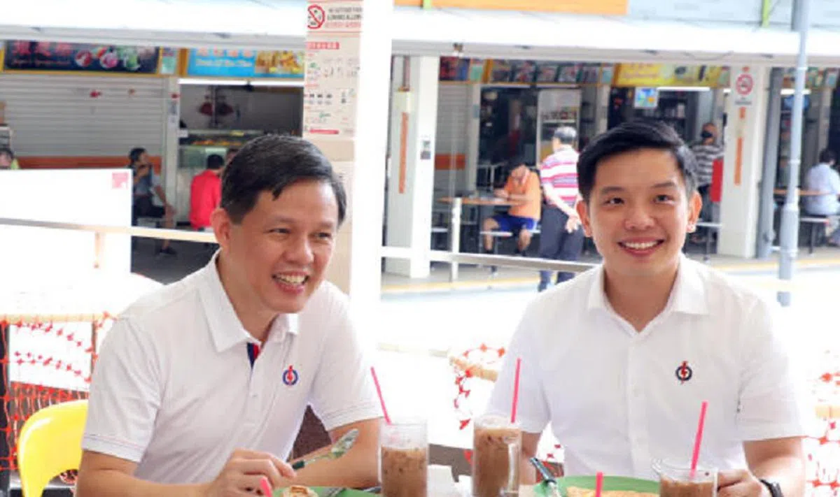  39岁的陈圣辉（右）与贸工部长陈振声同为人民行动党丹绒巴葛团队成员。（联合早报） 