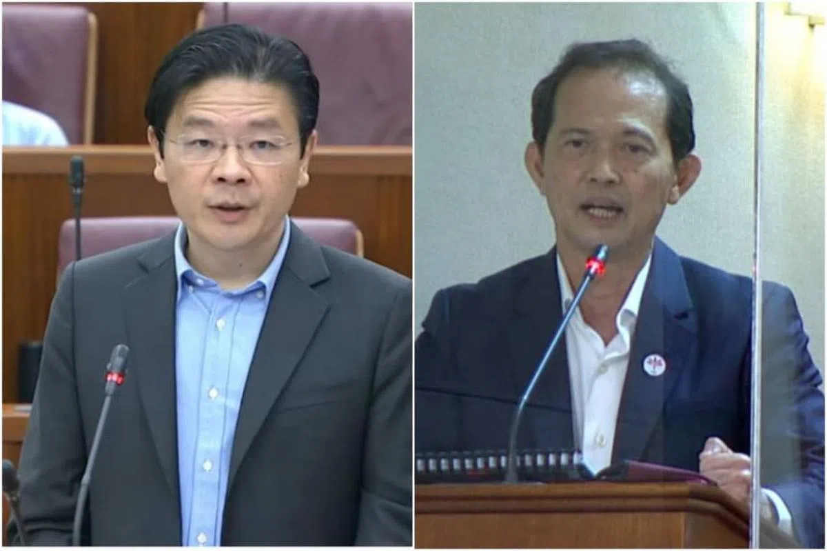 议员们就新加坡前进党非选区议员梁文辉（右）和财政部长黄循财（左）提出的两个动议展开辩论。（海峡时报）
