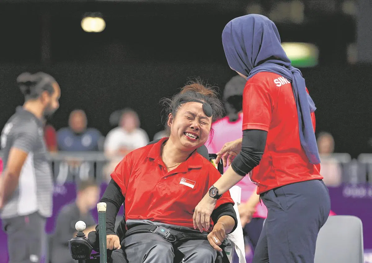 陈仪婷在硬地滚球女子BC1级半决赛获胜，确定为新加坡锁定一枚奖牌后，喜极而泣。（海峡时报）