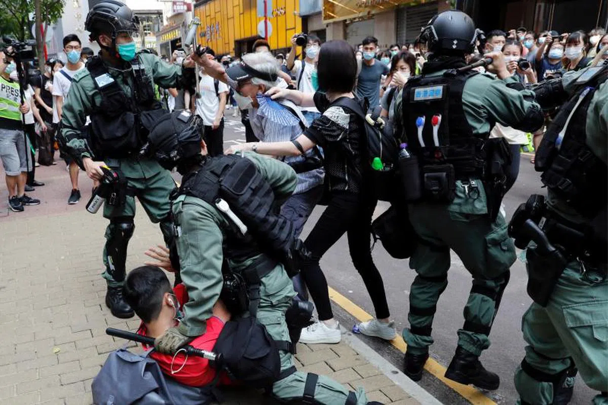  香港当局声称只要不犯法就不会被国安法对付。（路透社） 