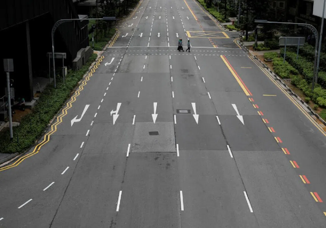 禁止闭令影响下，格外安静的道路。（路透社）