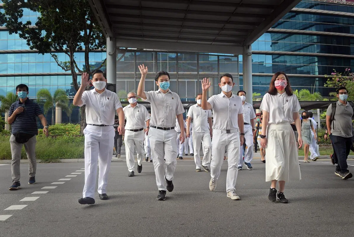 竞选期间的交锋，对黄循财来说也是一种考验。（海峡时报）