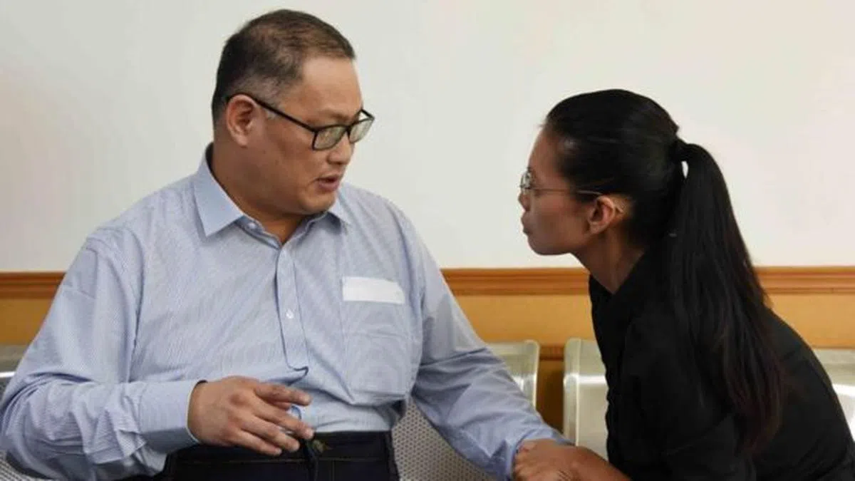  台湾维权运动人士李明哲（左）至今仍被囚禁在中国大陆。（中央社） 