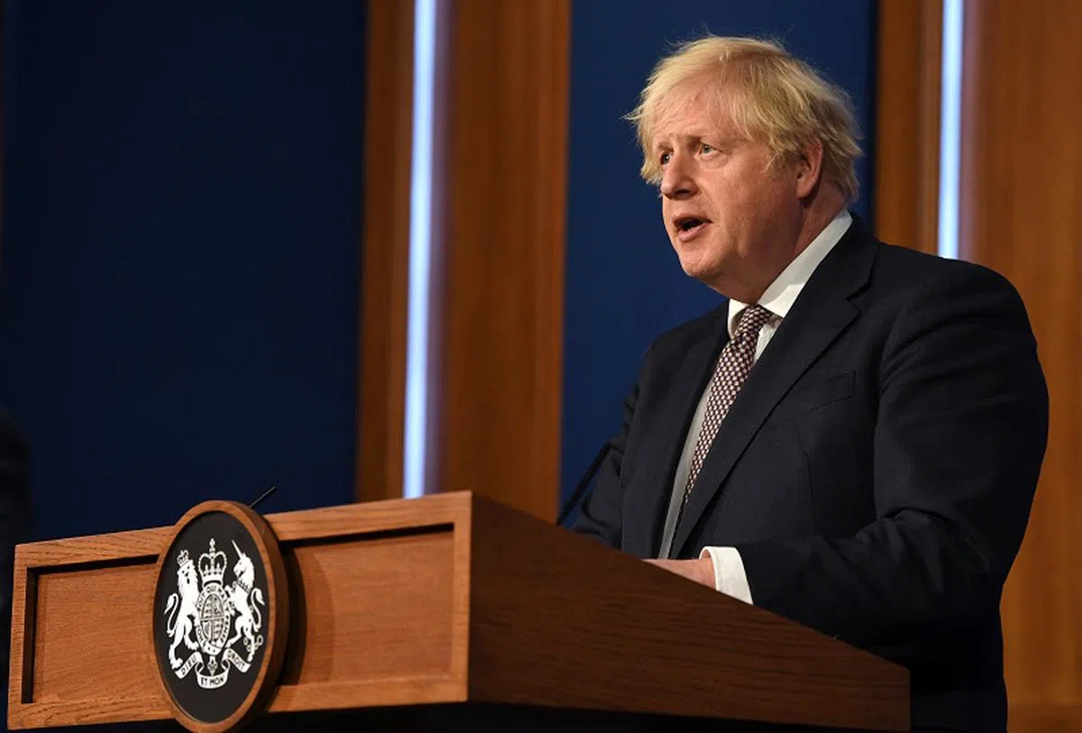  约翰逊不久前宣布英国抗疫胜利，本月19日将是英国的“自由解放日”。（路透社） 