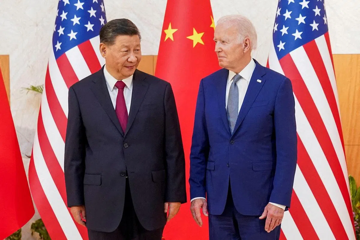 中国国家主席习近平（左）和美国总统拜登（右）上一次会晤，是在去年的G20峰会。（路透社）