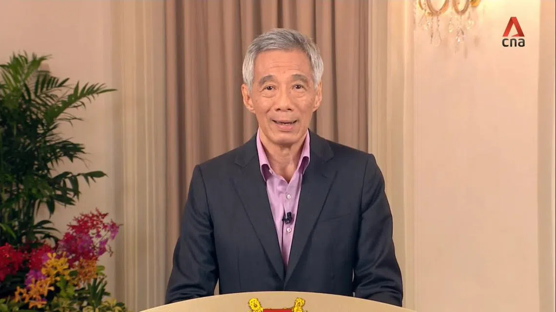 李显龙总理说，国人要回复正常生活，就必须谨记六字真言： 检测、追踪、接种！（李显龙总理面簿视频截图）