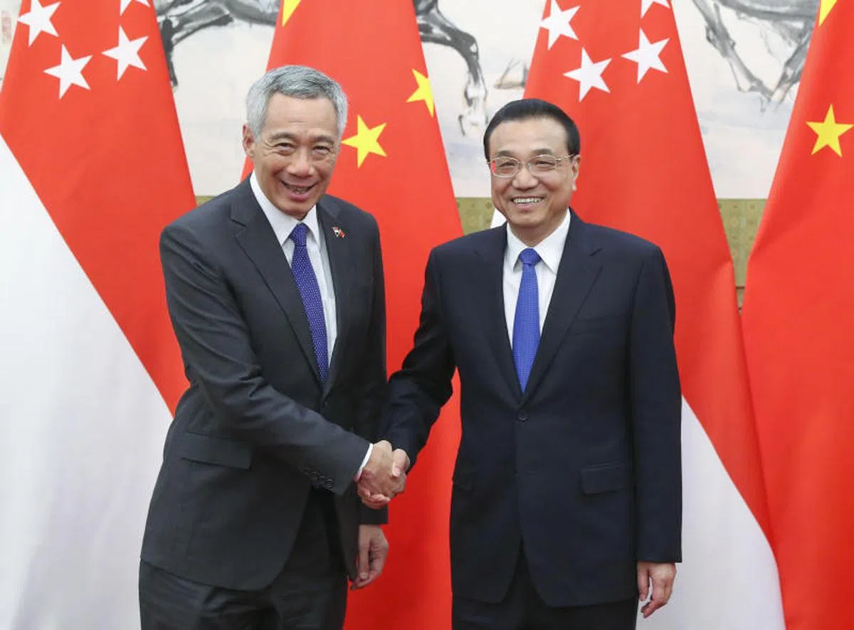  李显龙总理4月8日在北京会见中国总理李克强。（中新社） 