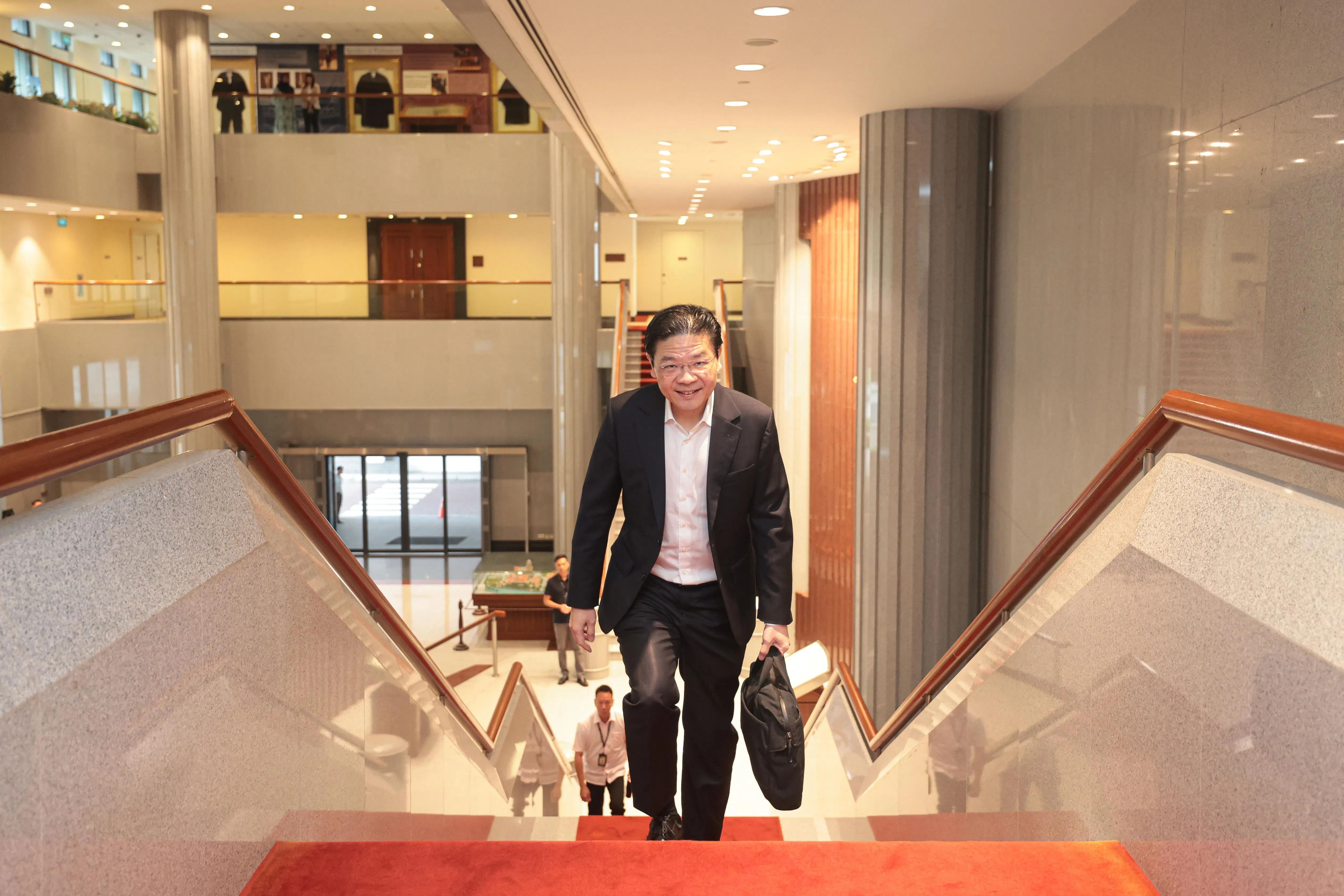 黄循财总理2月12日抵达国会大厦准备宣读2026年财政预算案。