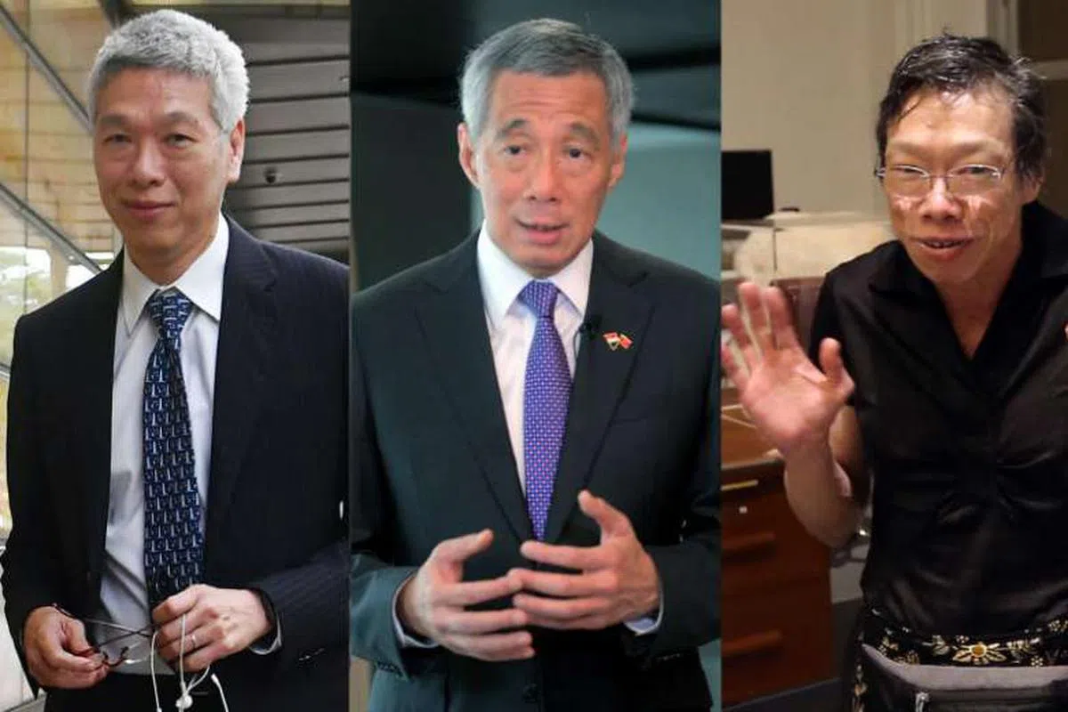  （左起）李显扬、李显龙、李玮玲 （海峡时报） 
