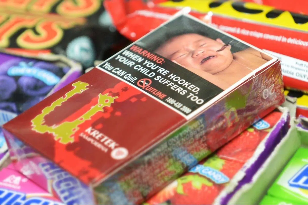  现有的警告图像占烟盒的50%面积。（海峡时报） 