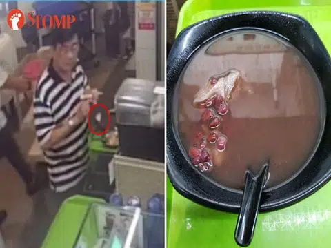 湿纸巾从食客手中脱落，意外又“精准”的跌进红豆汤中，合为一体。（Stomp）