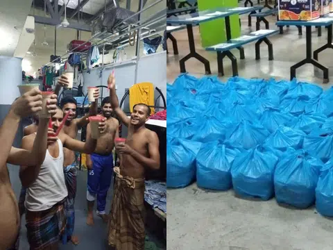 客工收到奶茶等暖心食物时，露出开心的笑容。（外籍劳工中心/江培生提供）