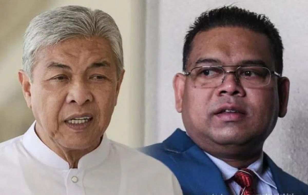  洛曼（右）要求阿末扎希在7天内退出国盟政府，否则他将要发动逼宫行动。（当今大马） 