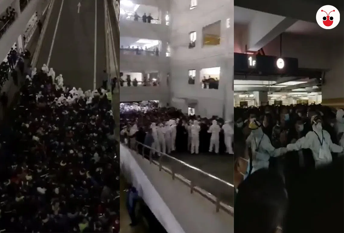 身穿白色隔离服的工作人员筑起人墙，试图维持现场混乱拥挤的场面。（红蚂蚁制图）