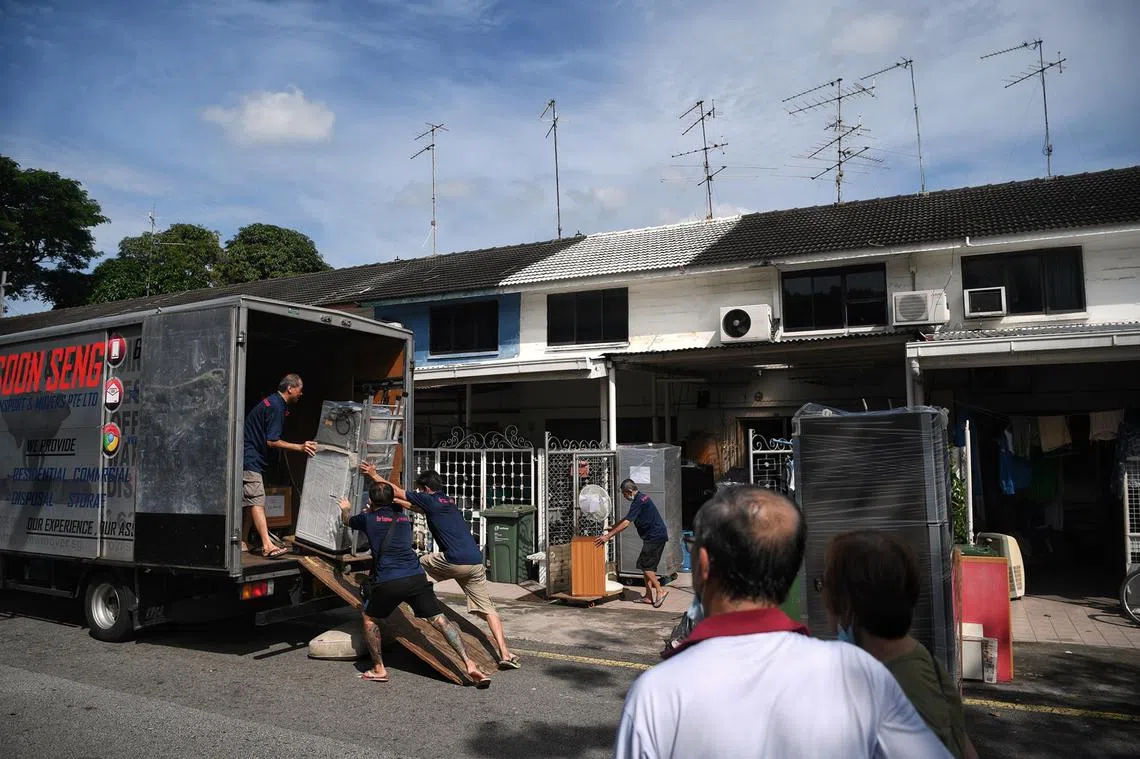 搬家。（海峡时报）