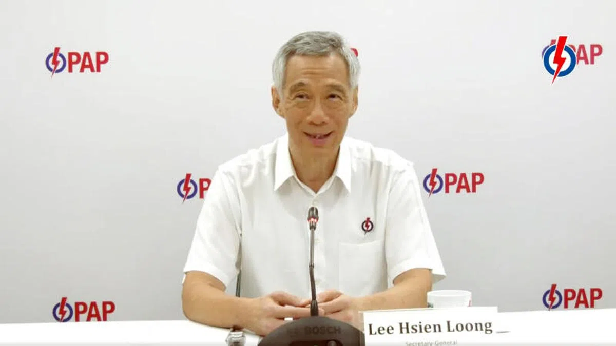  领军宏茂桥集选区的李总理今早召开记者会宣布该区阵容。（人民行动党提供） 