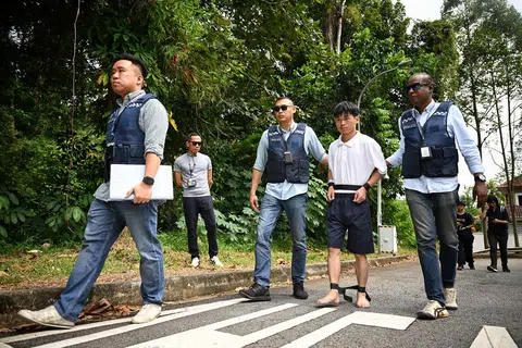 在中国当送餐员不是很好吗？干嘛来新加坡当犯罪团伙的跑腿？（海峡时报）