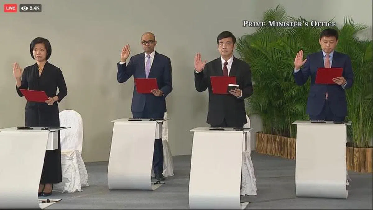  左起：国家发展部兼通讯及新闻部高级政务部长沈颖、卫生部兼通讯及新闻部高级政务部长普杰立、国防部高级政务部长王志豪、外交部兼交通部高级政务部长徐芳达。（视频截图） 