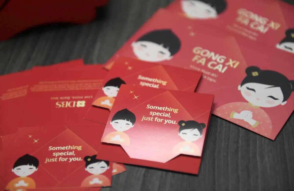  印有QR红包码的电子红包。（海峡时报） 