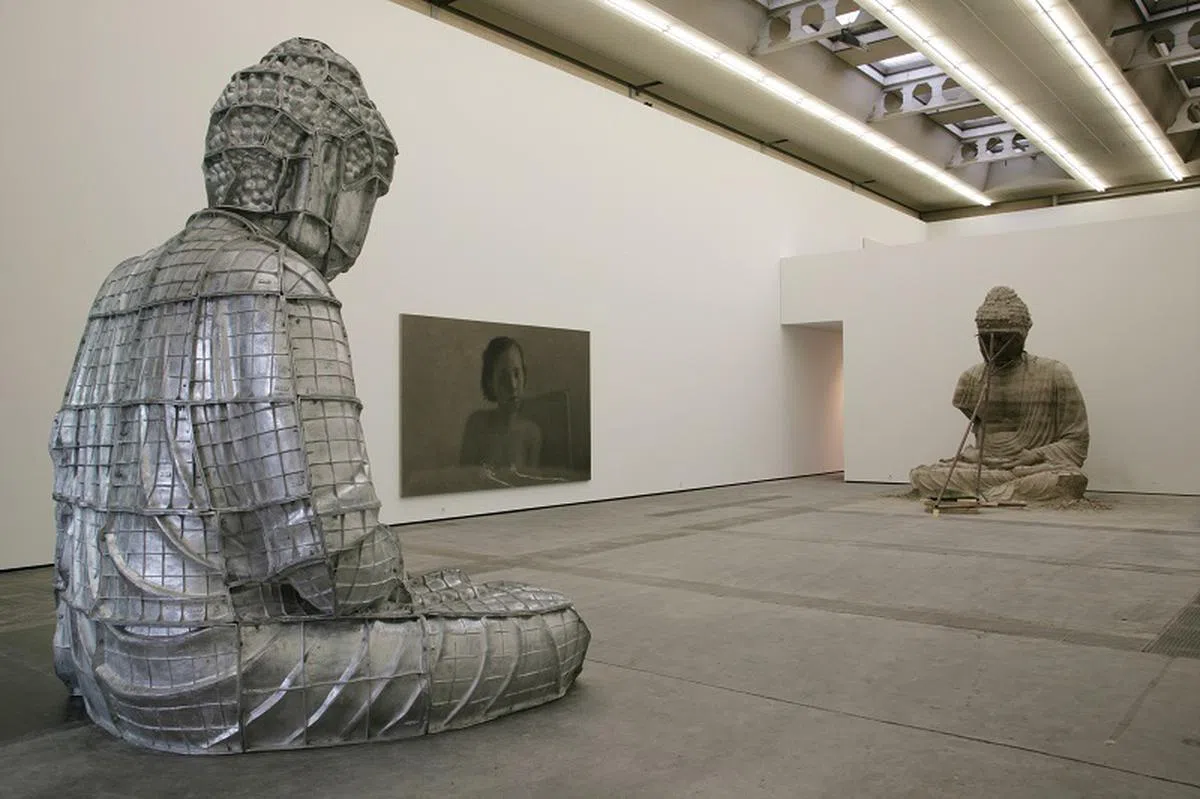  “艺术登陆新加坡2013年”展出中国艺术家张洹也将带来由两个大型佛像雕塑组成的《柏林佛》，作品预计标价为100万美元，是此次艺博会最昂贵作品之一。（艺术登陆提供） 