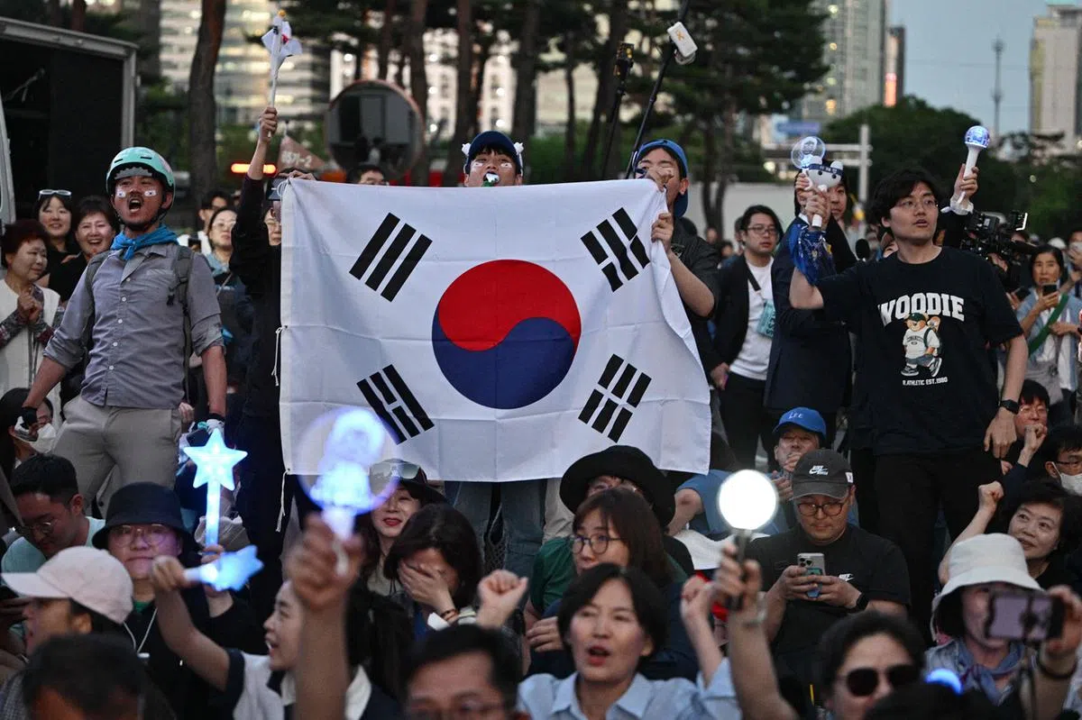 共同民主党候选人李在明的支持者。（法新社）