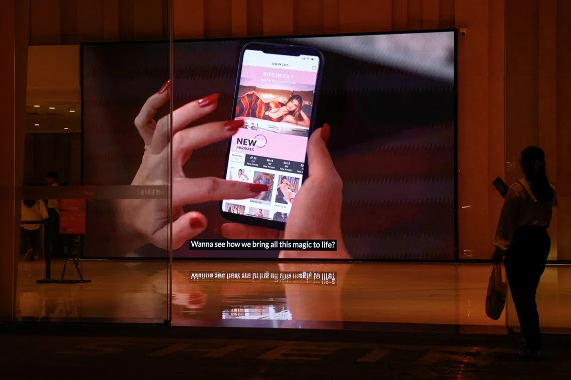 标着“中国制造”的衣食住行甚至是文化娱乐早已悄然进入许多新加坡人生活的方方面面。图为中国快时尚电商希音（SHEIN）在广州的办公大楼。（路透社）
