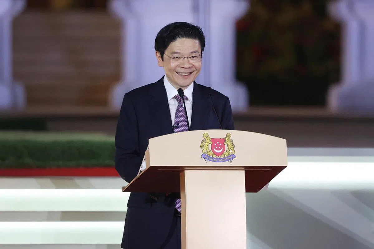 黄循财在就职仪式上，以马来语、华语和英语发表演讲。（联合早报）