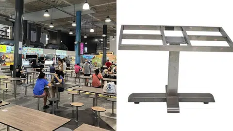 “无桌面”设计的餐桌，是直接将食客捧餐的托盘转换为“移动桌面”，用餐后归还托盘和餐具，根本无须清洁“桌面”。（联合早报）