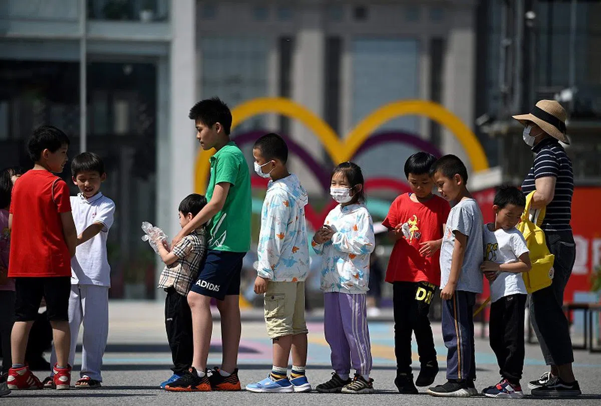 中国五年内两度调整生育政策。（法新社）