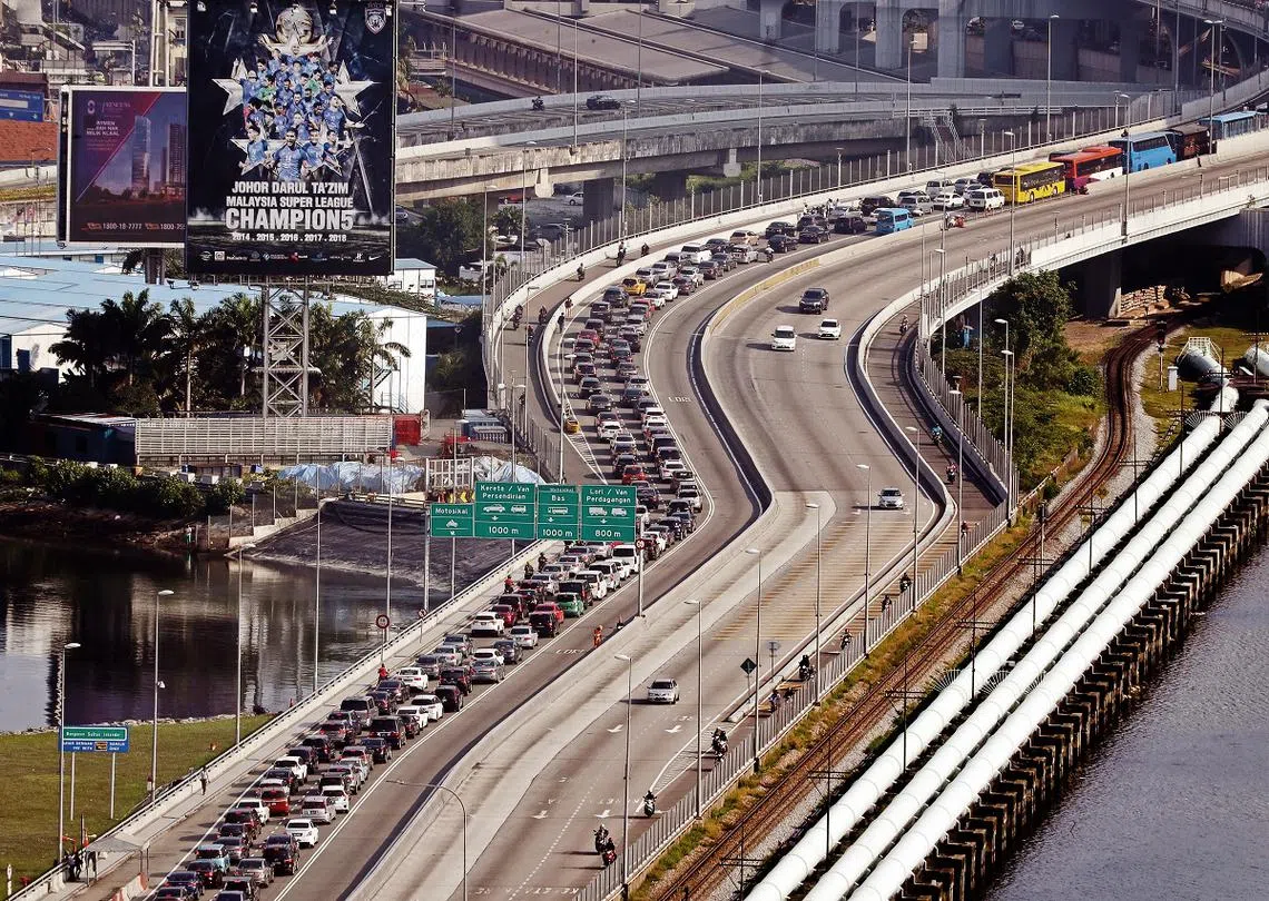 兀兰关卡堵车一幕有望走入历史？（联合早报）